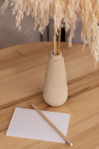 Close-up of feather on table