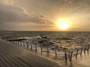 Scenic view of sea against sky during sunset