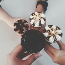 Close-up of hand holding ice cream