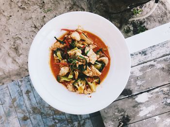 High angle view of salad in bowl on table