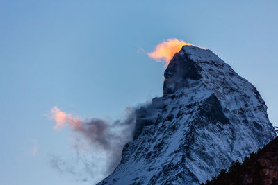 Panoramic view of the matterhorn, typical cloud formation.