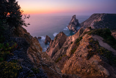 Scenic view of sea against sky during sunset