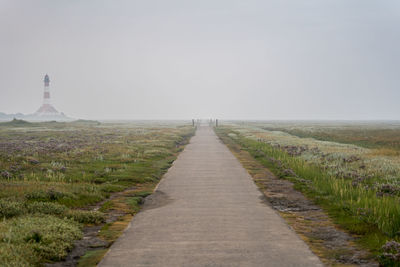 Scenic view of field against clear sky