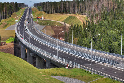 High angle view of road amidst trees