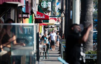 People on street in city