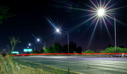 Light trails on road at night