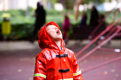 Portrait of boy standing outdoors