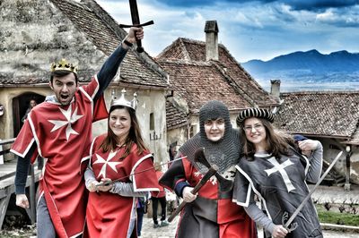 Four people in medieval costumes