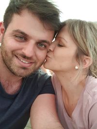 Portrait of smiling young couple