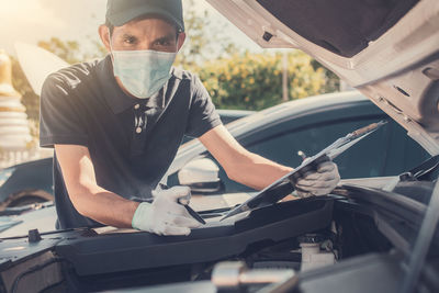 Man working on car