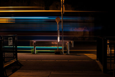 Blurred motion of bus at busstop