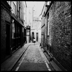 Narrow alley amidst buildings