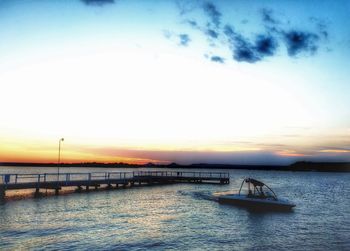 Scenic view of sea at sunset