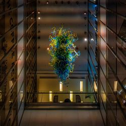 Low angle view of illuminated window in building