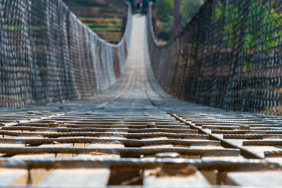 Surface level of footbridge on footpath