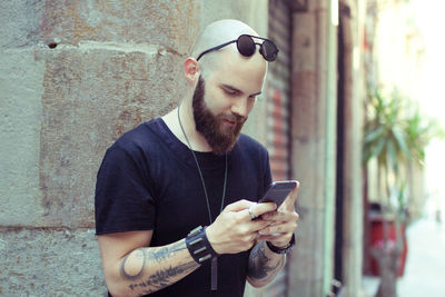 Young man using mobile phone