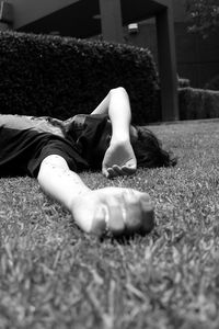 Woman lying on grass