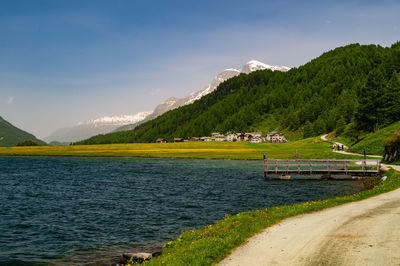 The village of isola in summer, on lake sils, engadin, switzerland.