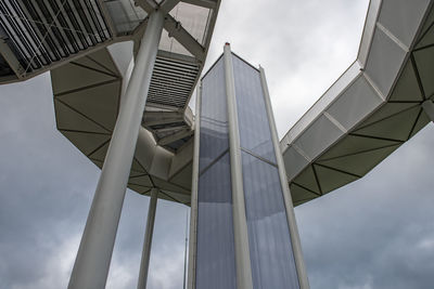 Low angle view of bridge against sky in city