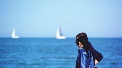 People standing on beach