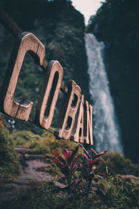 Close-up of text on shore