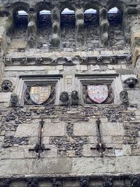 Low angle view of carving on old building