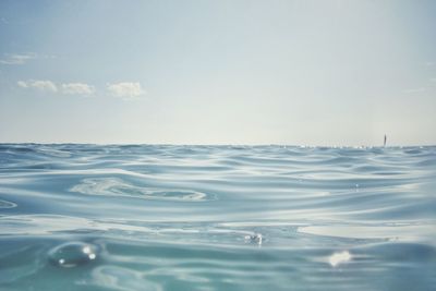 Scenic view of sea against sky on sunny day