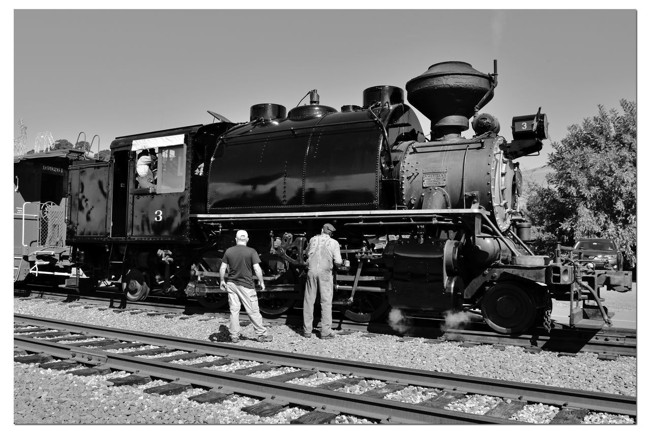 TRAIN ON RAILROAD TRACK