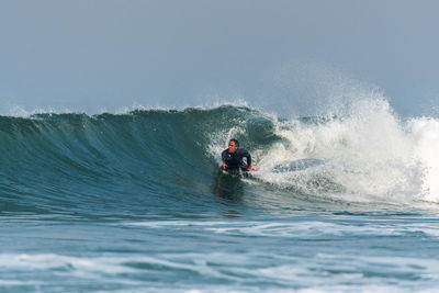 Man surfing in sea