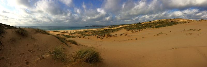Panoramic view of beach against sky