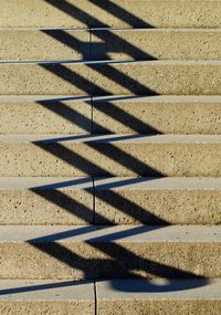 High angle view of shadow on wall