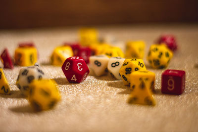 Close-up of dice on textile