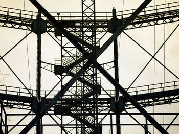 Low angle view of electricity pylon