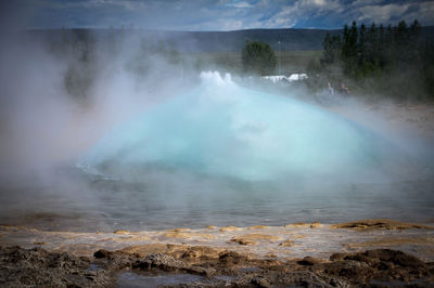 View of steam over hot spring