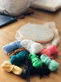 Multi colored wools on table