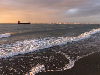 Scenic view of sea against sky during sunset