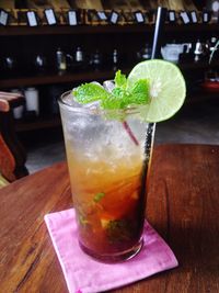 Close-up of drink on wooden table