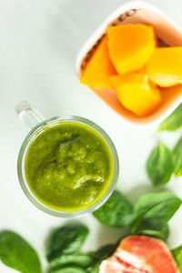 High angle view of fruits in glass on table