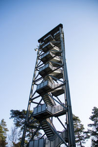 Low angle view of metal structure against clear sky