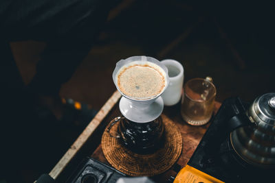 High angle view of coffee cup on table