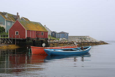 Boats in peggys cove on a misty day. 