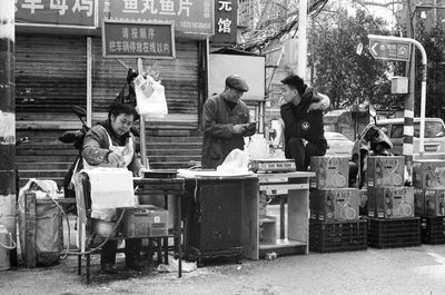 People on street in city