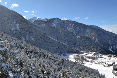 Scenic view of mountains against sky during winter