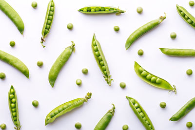 High angle view of fruits over white background