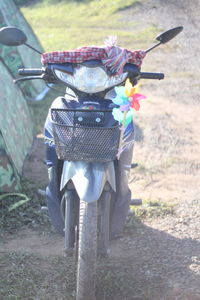 Bicycle in basket on field