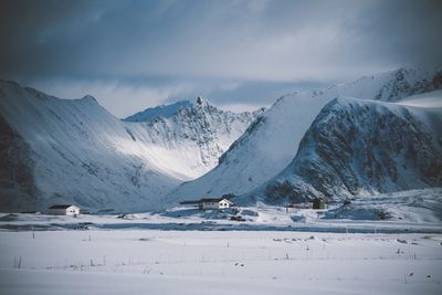 Scenic view of snowcapped mountains against sky