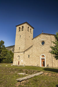 Historic building against clear blue sky