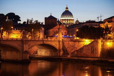 Reflection of illuminated buildings in water