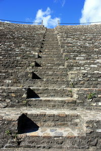 Low angle view of steps against sky