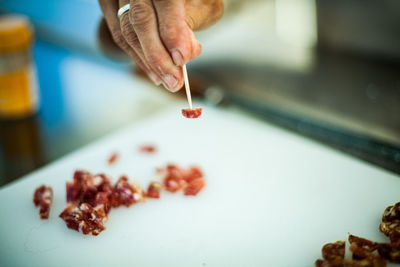 Close-up of hand holding ice cream